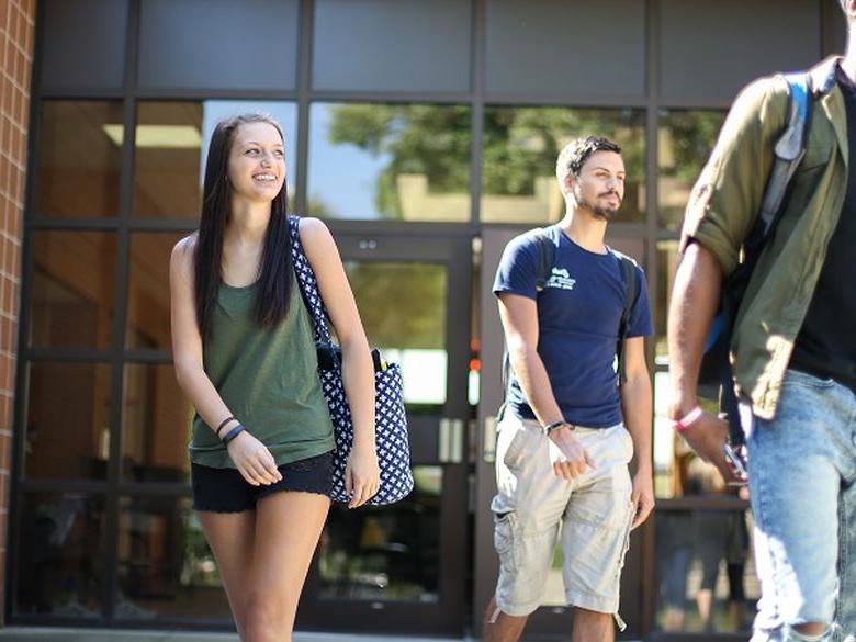 students walking outside from Smeal building on DuBois campus